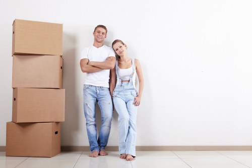 Local man with van moving furniture in Highbury