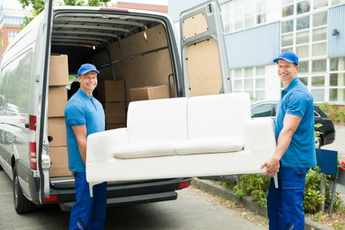 Moving van and household boxes in a Highbury residential street
