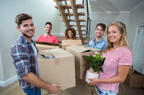 House movers preparing a Highbury home move with boxes and furniture