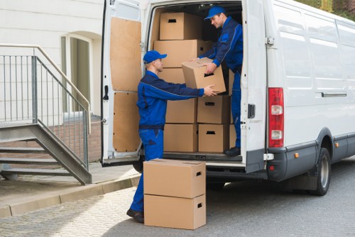Loading items carefully with attention to safe handling practices