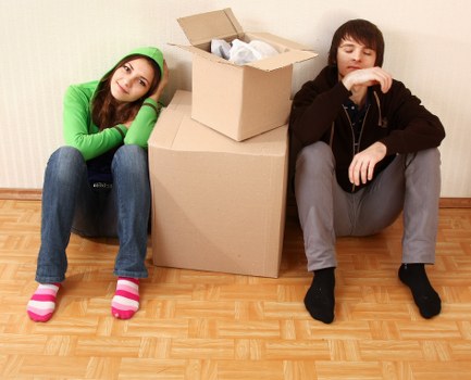 Local movers handling boxes and furniture in Highbury