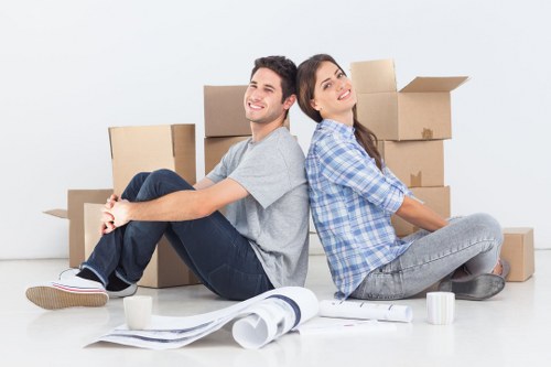 Removal team loading household items for a North London move