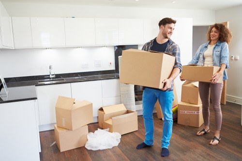 Loading office items into a moving vehicle near Highbury