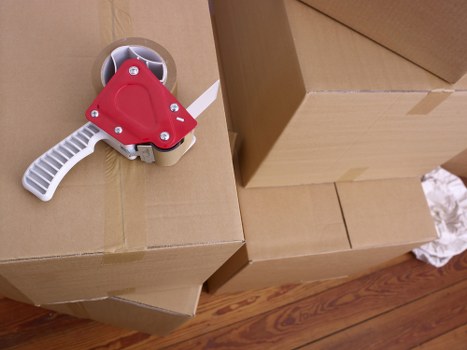 Packed boxes and protective wrap ready for a home move in Highbury