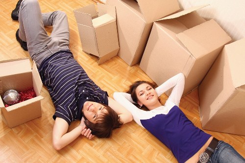 Professional movers unloading items at a Highbury property