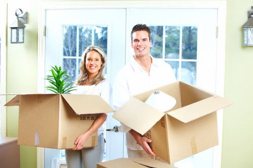Packed boxes and furniture loaded into a removal truck